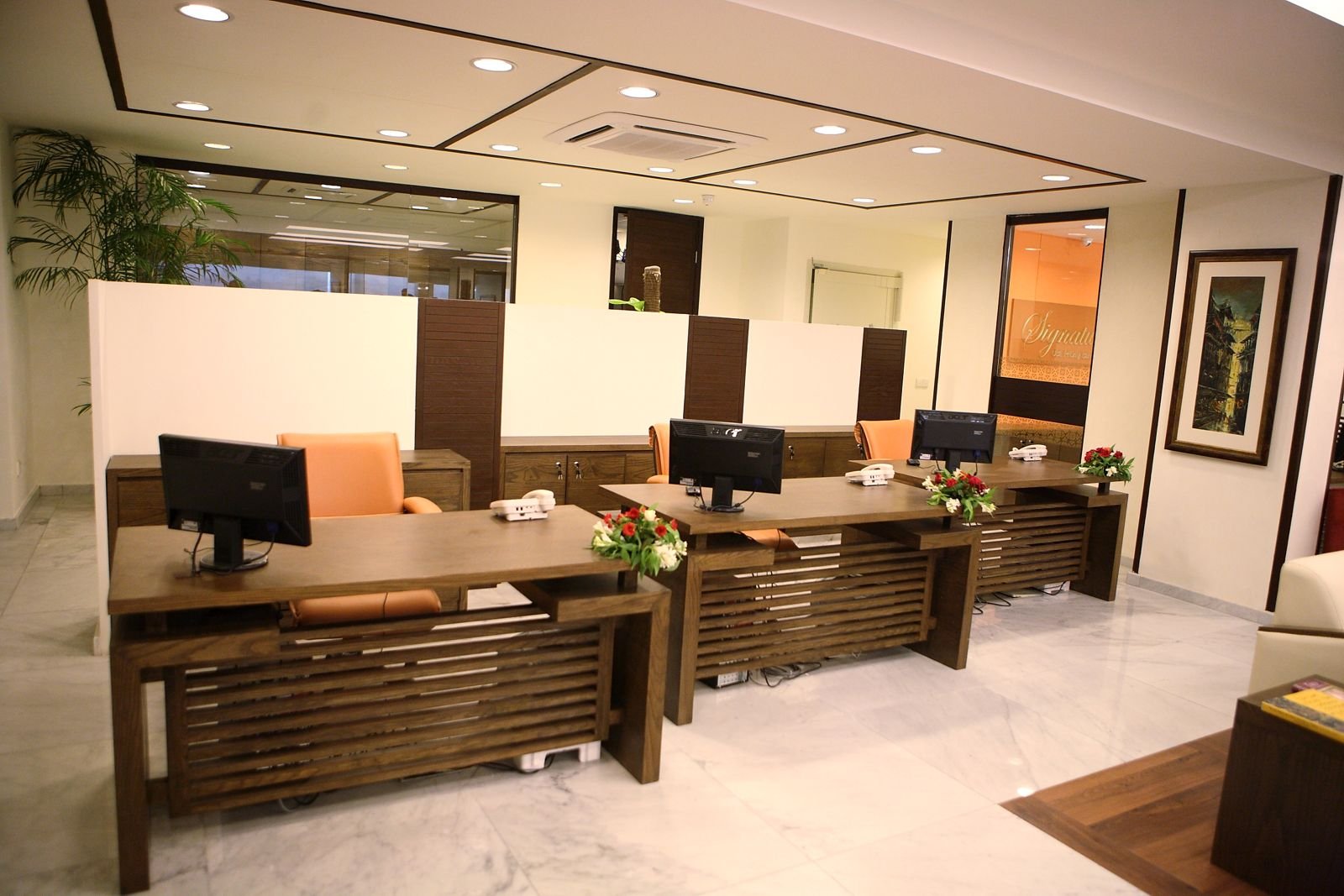 Custom wooden counter desks in a banking hall